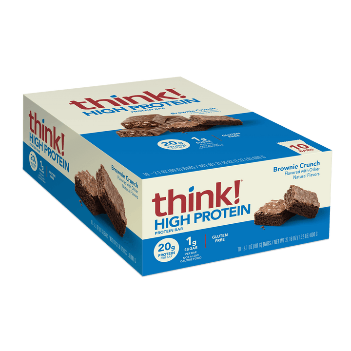 Box of "think! High Protein" bars, featuring brown and blue colors. The flavor is Brownie Crunch with 20g protein, 1g sugar, and gluten-free.