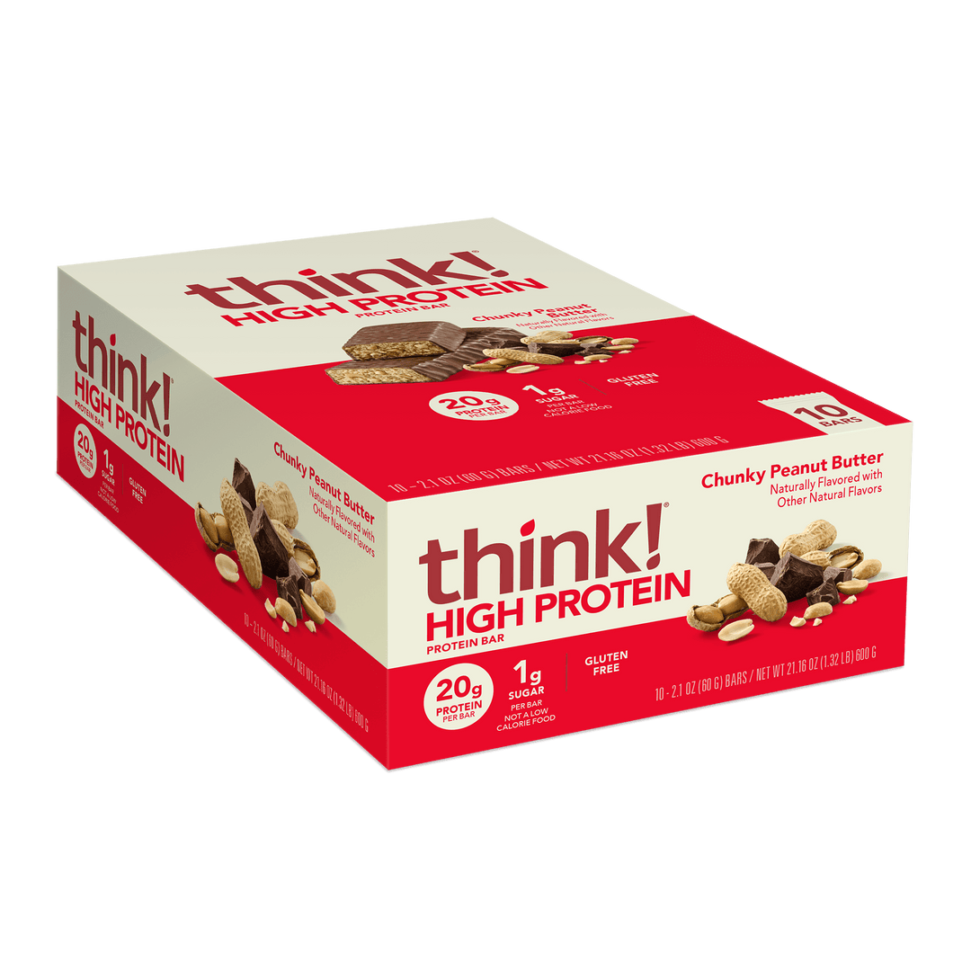 Box of think! High Protein bars, Chunky Peanut Butter flavor. Red and white packaging, highlighting 20g protein, 1g sugar, gluten-free. Bars and peanuts pictured.