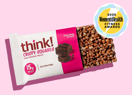 think! Crispy Squares Chocolate Crunch protein bar packaging on a pink background with Women's Health Fitness Awards badge.